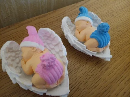 مجسمه سنگی مدل نوزاد روی بال فرشته