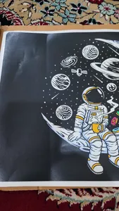 تجریه خرید استیکر لپ تاپ توییجین و موییجین طرح Astronaut کد 08 مناسب برای لپ تاپ 15.6 اینچ به همراه برچسب حروف فارسی کیبورد