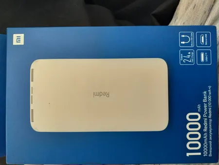 پاوربانک 10 وات شیائومی مدل Redmi ظرفیت 10000 میلی آمپر ساعت به همراه کابل تبدیل microUSB