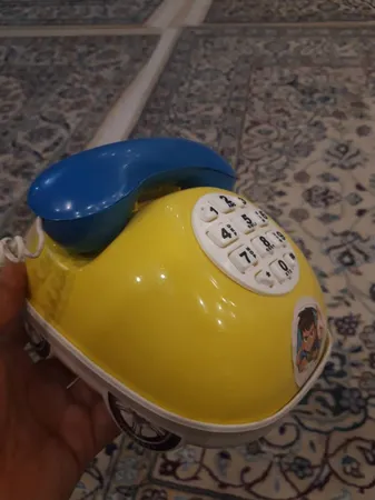 قلک طرح اسباب بازی تلفن و ماشین