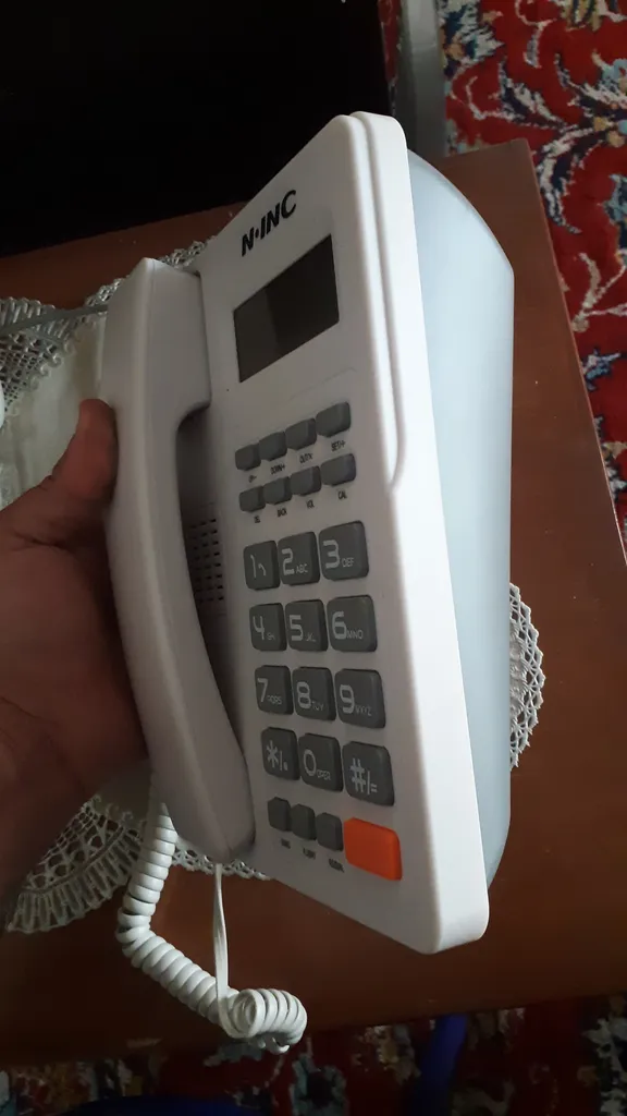 تلفن ناینک مدل 8204CID