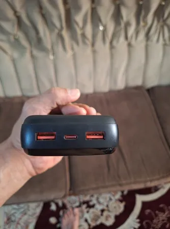 پاوربانک 18 وات اکستروم مدل APB20K22W-B ظرفیت 20000 میلی آمپر ساعت