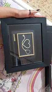 تجریه خرید تابلو طلا کوب زرکات طرح گوشی پزشکی مدل F190