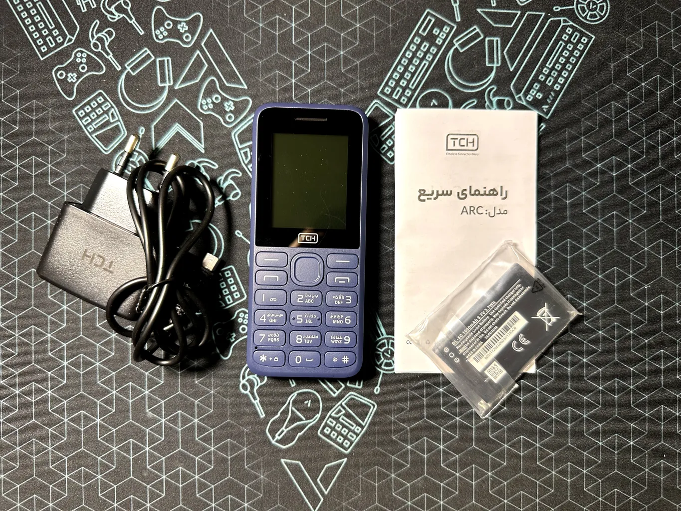 گوشی موبایل تی سی اچ مدل ARC دو سیم‌کارت ظرفیت 4 مگابایت