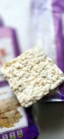 رایس کیک چند غله بدون روغن  اُ آ ب  - 100 گرم بسته 2 عددی