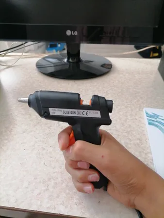 دستگاه چسب تفنگی جانسون مدل FL-138B به همراه یک عدد چسب حرارتی جانسون بصورت رایگان