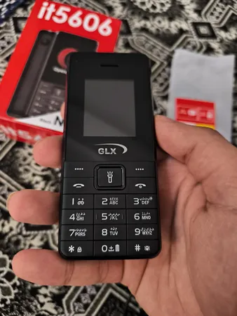 گوشی موبایل جی ال ایکس مدل iT5606 دو سیم کارت ظرفیت 32 مگابایت و رم 32 مگابایت