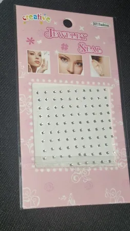 پیرسینگ بینی زنانه مدل چسبی طرح الماس کد nos110 بسته 100 عددی