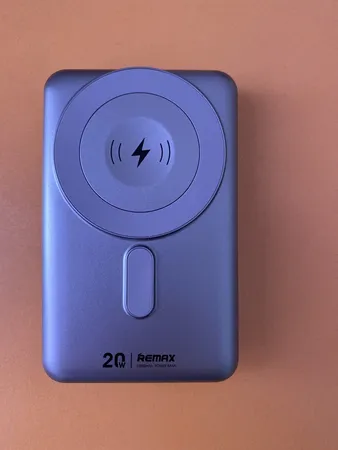 پاور بانک ریمکس مدل مگنتیک وایرلس CX-2 ظرفیت 10000 میلی آمپر ساعت