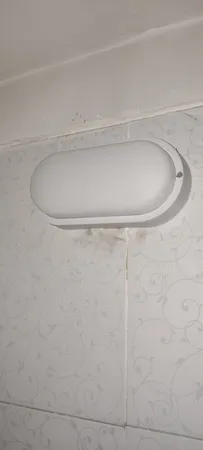 چراغ حمام دیواری پرتو درخشان مدل واترپروف IP65 طرح روکار بیضی