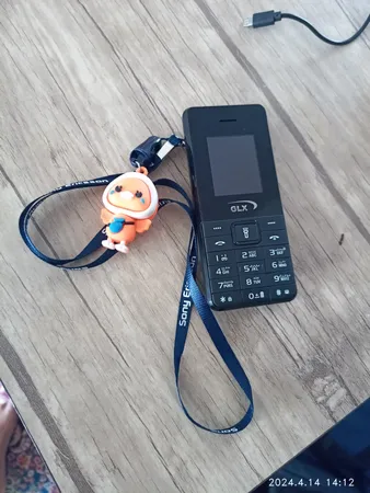 گوشی موبایل جی ال ایکس مدل iT5606 دو سیم کارت ظرفیت 32 مگابایت و رم 32 مگابایت