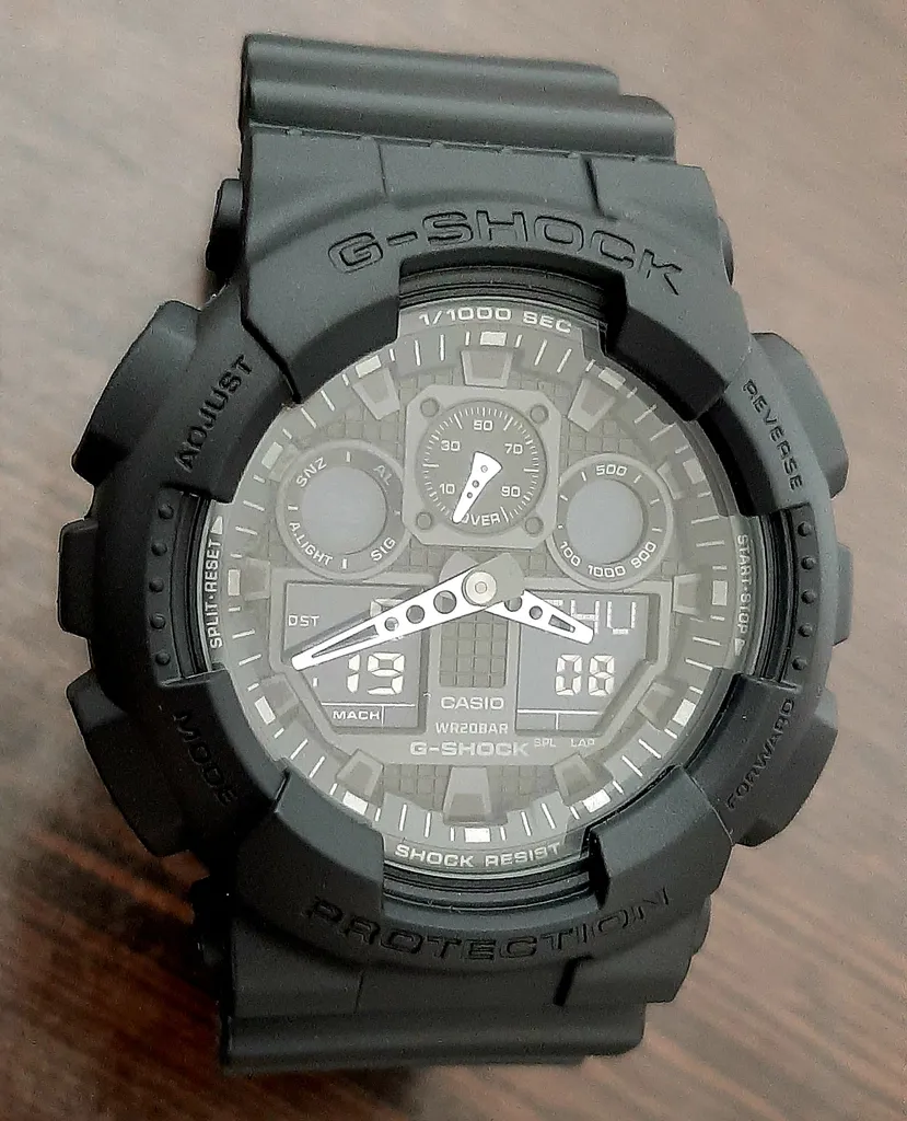 ساعت مچی عقربه ای مردانه کاسیو مدل GA-100-1A1DR