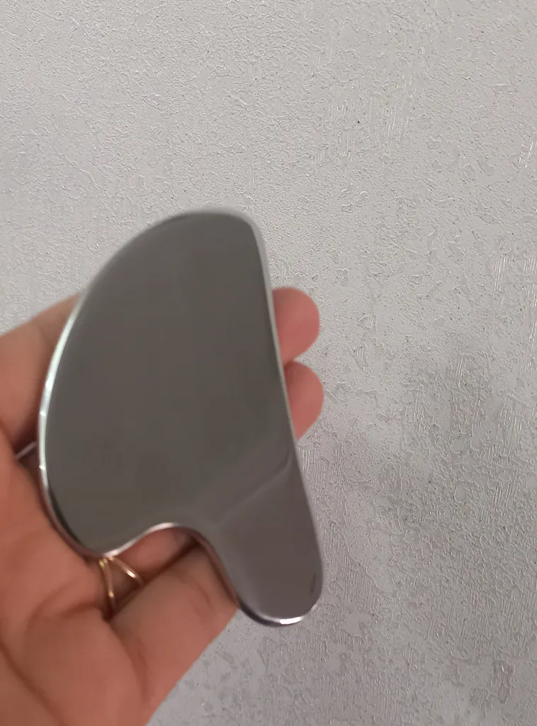 ماساژور دستی صورت مدل گوآشا استیل