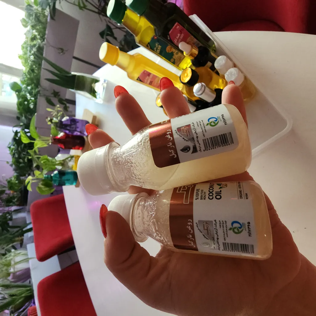 روغن نارگیل نرمک طلایی مدل 02 حجم 60 میلی لیتر مجموعه 2 عددی