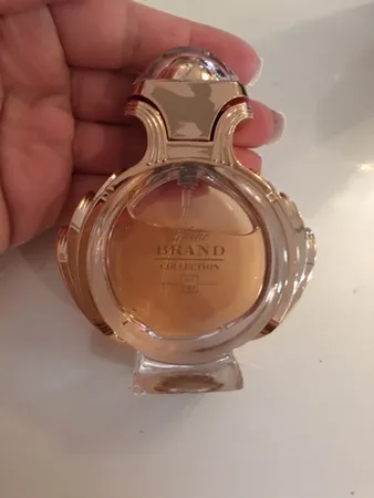 عطر جیبی زنانه نیچ برند کالکشن مدل Olympea حجم 25 میلی لیتر
