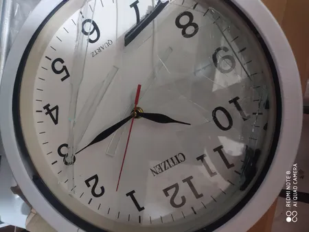 ساعت دیواری عقربه ای سیتیزن طرح دایره مدل اعداد لاتین