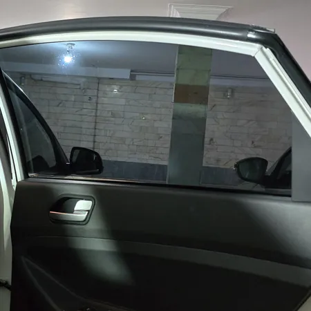 برچسب دودی شیشه خودرو اکانو مدل 35 درصد رول 4 متری