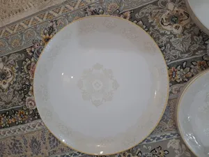 تجریه خرید سرویس غذاخوری 26 پارچه دینو طرح دایره مدل طاریفا