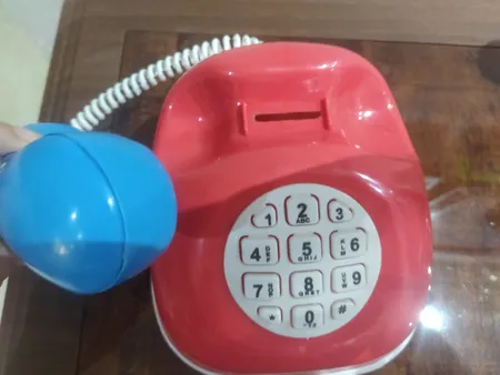 قلک طرح اسباب بازی تلفن و ماشین