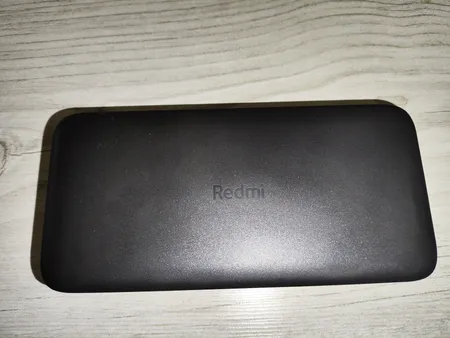 پاوربانک 18 وات شیائومی مدل Redmi PB200LZM ظرفیت 20000 میلی آمپرساعت به همراه شارژر دیواری سامسونگ و کابل تبدیل