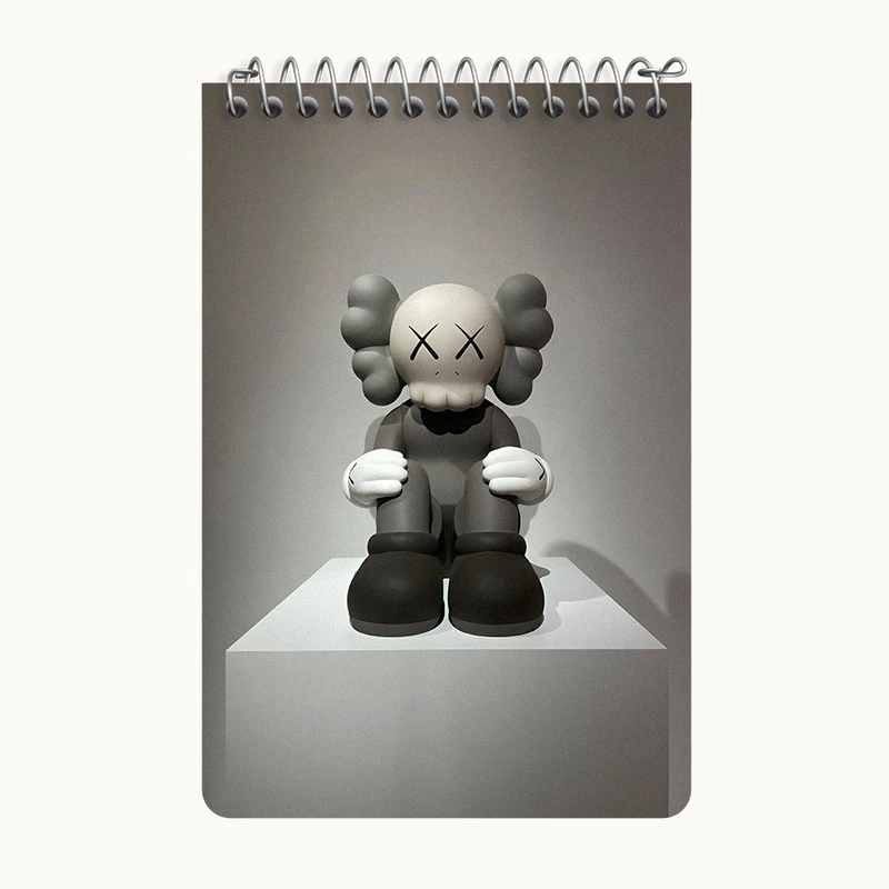 دفتر یادداشت 50 برگ خندالو طرح عروسک کاز (kaws) کد F3999