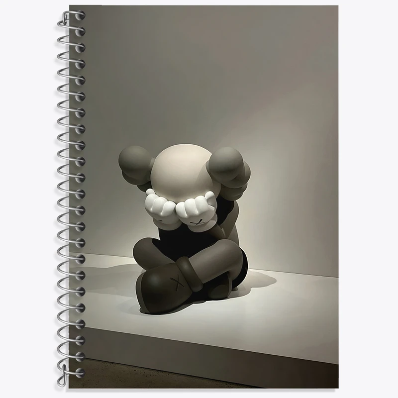 دفتر زبان دوخط 50 برگ خندالو طرح عروسک کاز (kaws) کد F3998