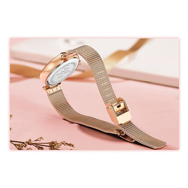 ساعت مچی عقربه ای زنانه نیوی فورس مدل NF5019 RGGN ساعت مچی عقربه ای زنانه نیوی فورس مدل NF5019 RGGN