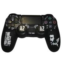 محافظ دسته پلی استیشن ۴ مدل the last of us 2 TLOA به همراه روکش آنالوگ
