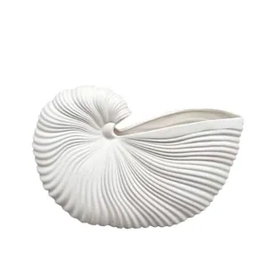 گلدان بتنی طرح مینیمال مدل حلزون