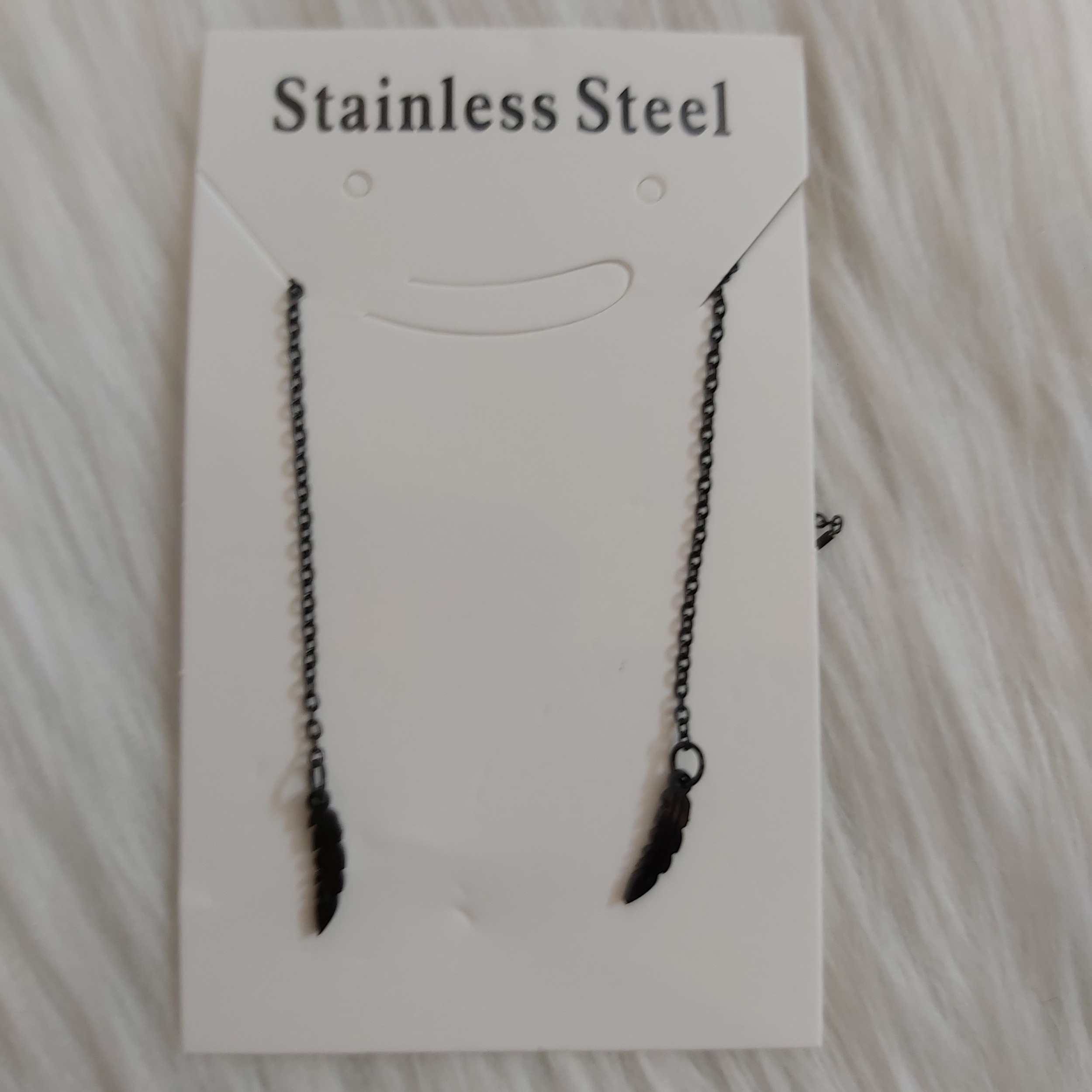 گوشواره زنانه مدل بخیه طرح پر کد r111 گوشواره زنانه مدل بخیه طرح پر کد r111