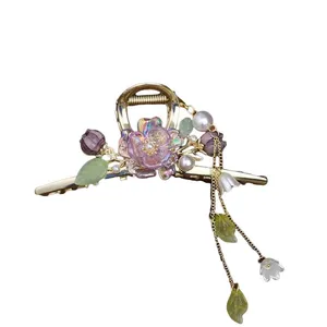 کلیپس مو زنانه مدل کریستالی طرح شکوفه آویزدار