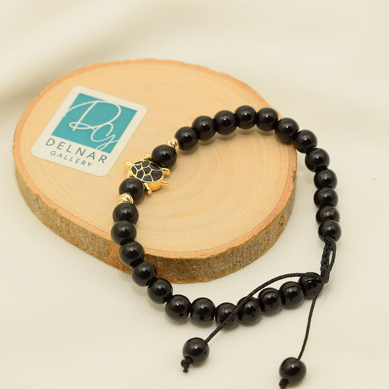 دستبند زنانه دلنار گالری مدل لاک پشت و گوی آلبرنادو دستبند زنانه دلنار گالری مدل لاک پشت و گوی آلبرنادو