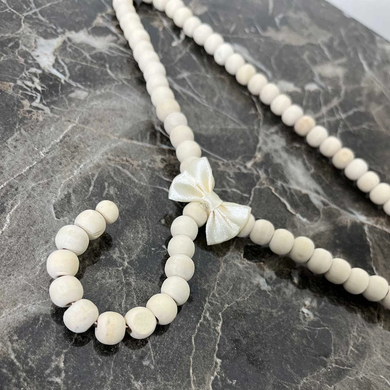 عکس شماره 3 : چوب لباسی نوزاد مدل چوبی مرواریدی