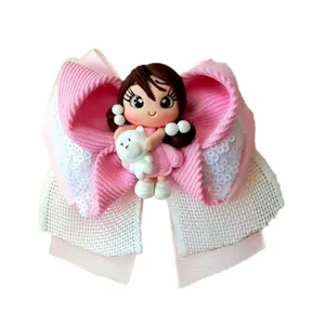 گیره مو دخترانه مدل پاپیون عروسک دار