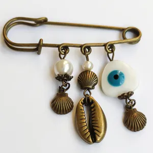 سنجاق سینه زنانه مدل گوش ماهی