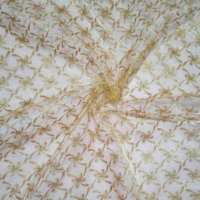 پارچه لباس عرض 0.5 متر مدل تور حریر شیشه ای گیفت رنگ طلایی