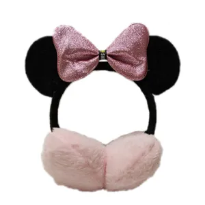 گوش گیر زمستانی بچگانه مدل پاپیونی رنگ صورتی روشن