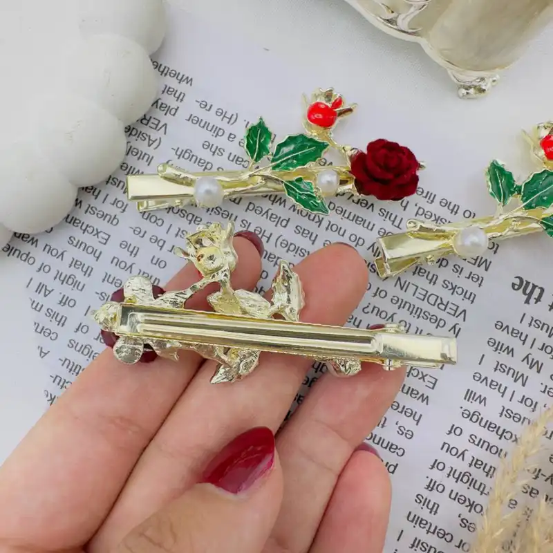 گیره مو زنانه مدل انبری طرح شکوفه انار