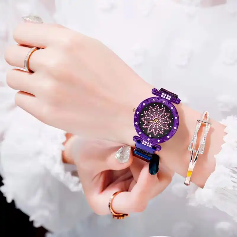 ساعت مچی عقربه ای زنانه مدل چرخشی کد1