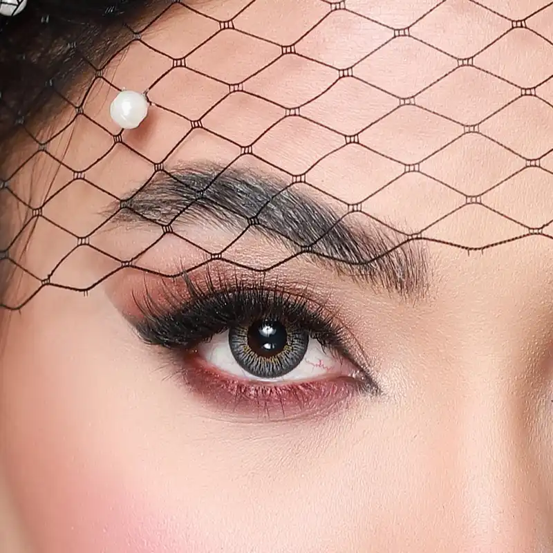 لنز چشم هرا کد H310 رنگ  طوسی عسلی دور دار