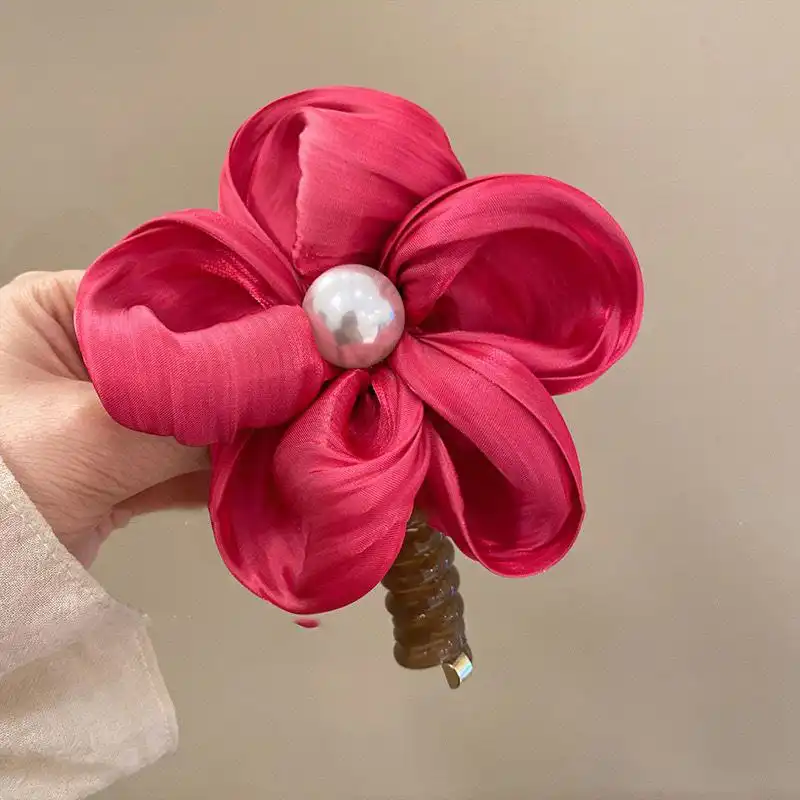 کش مو زنانه مدل فنری طرح گل کاغذی