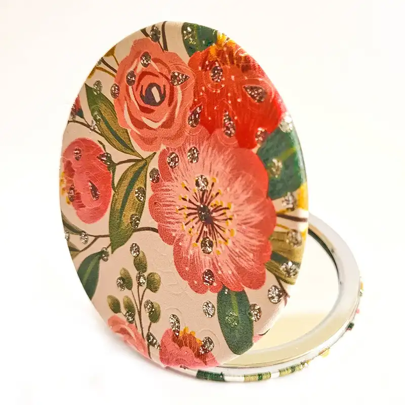 آینه جیبی مدل نگین دار چرمی گل دار نیک ثمر