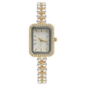 ساعت مچی عقربه‌ای کوارتز زنانه مدل لوکس بند مرواریدی دستبندی کد ۳