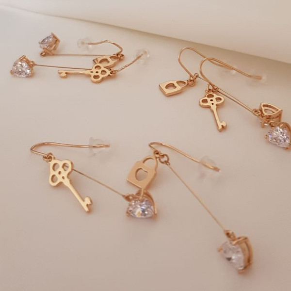 گوشواره دخترانه ژوپینگ مدل قفل و کلید xp2966 گوشواره دخترانه ژوپینگ مدل قفل و کلید xp2966