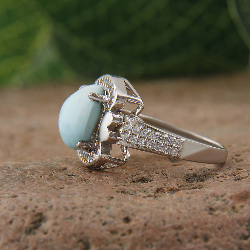 انگشتر نقره زنانه بازرگانی میلادی مدل سنگ فیروزه طبیعی نگین برلیان بدون ریزش آبکاری رادیوم کد AWR_1599