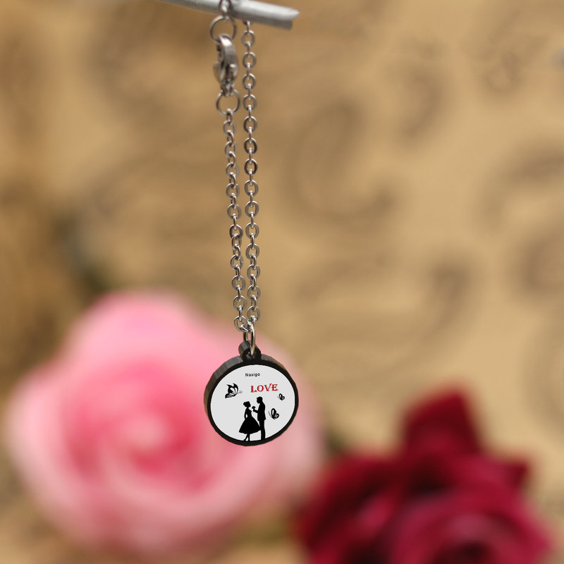 آویز ساعت زنانه ناکسیگو مدل شب تاب طرح Love کد AW8805