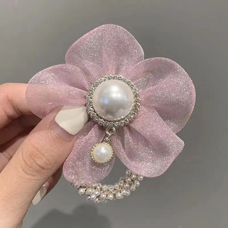 کش مو زنانه مدل مروارید و گل بابونه