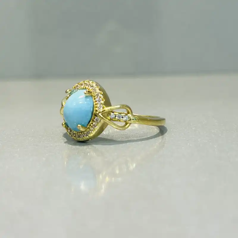 انگشتر نقره زنانه مدل جواهری با روکش طلا و فیروزه نیشابوری 990-13