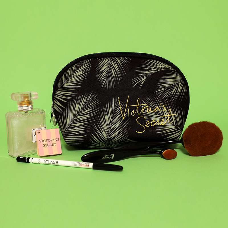 کیف لوازم آرایش زنانه مدل صدفی طرح برگ