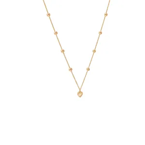 گردنبند طلا 18 عیار زنانه با زنجیر بیزمارک الی گالری مدل تمام گوی و قلب برجسته 